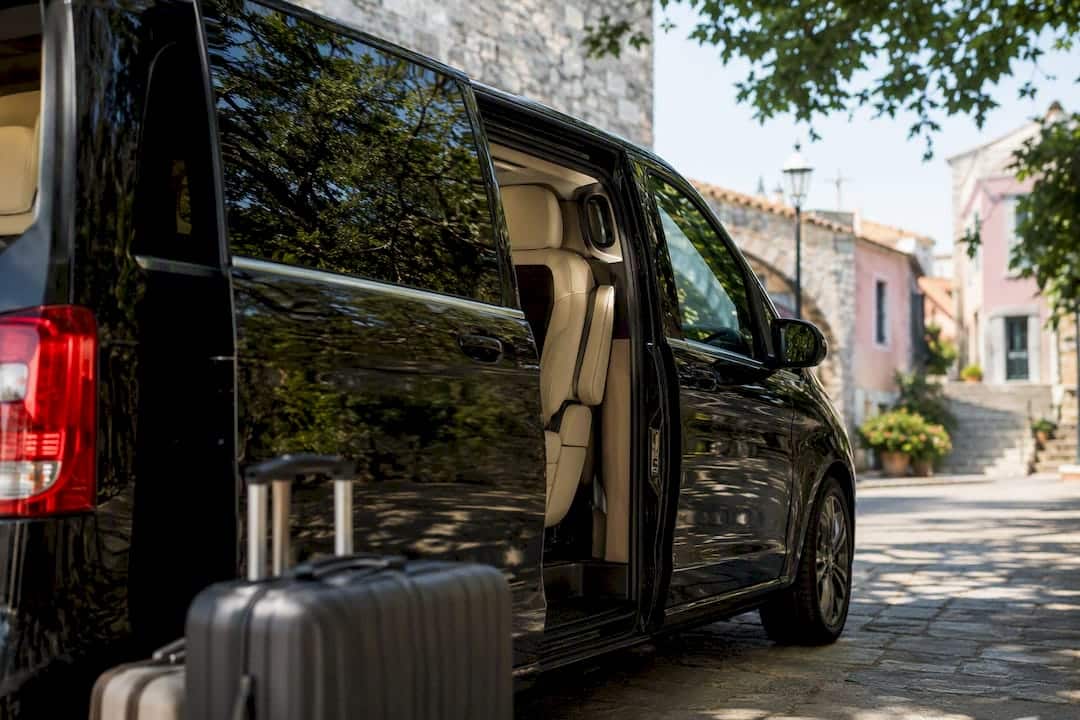 Luxury transfer vehicle door open by Croatian street