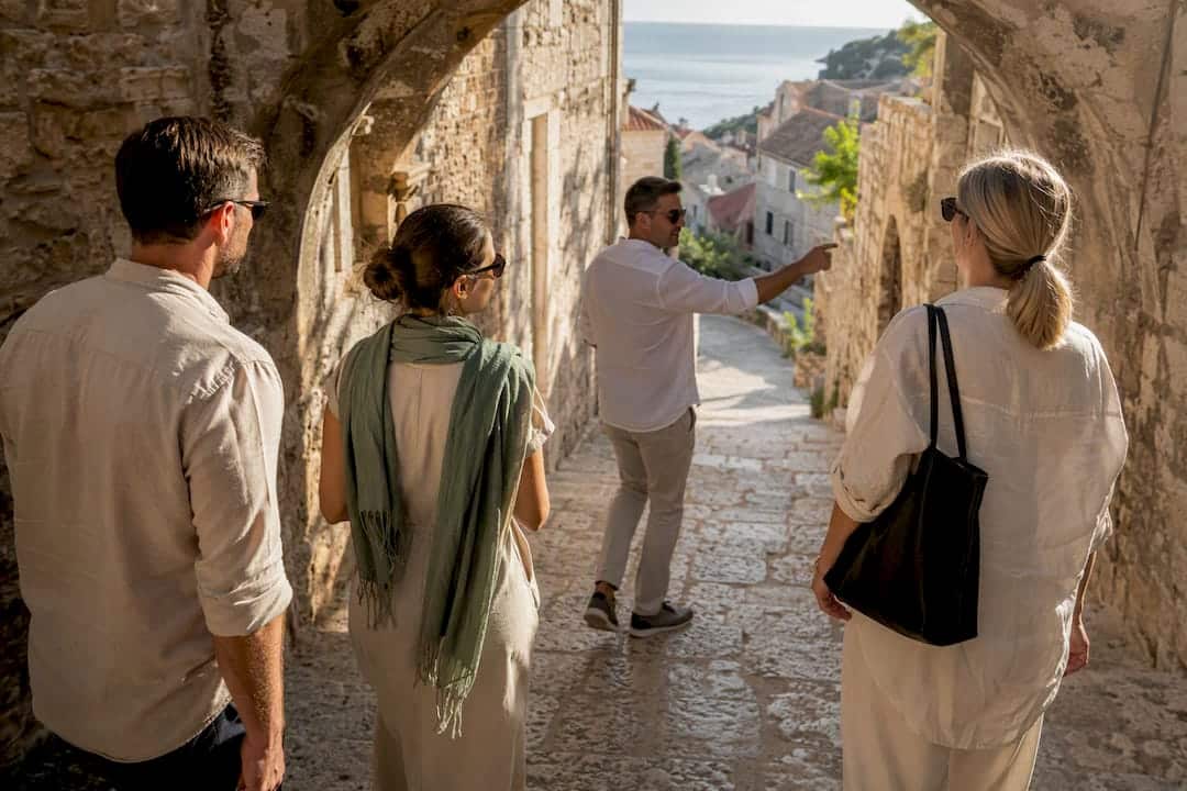 Private travelers exploring Hvar Town with driver